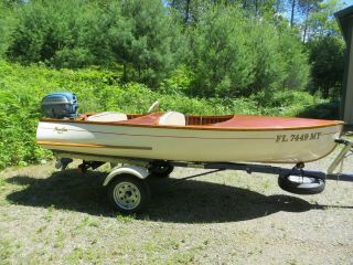 Vintage 1953 12 ' Penn Yan Swift outboard boat with motor and trailer 10