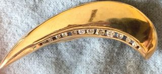 Vintage 14k gold 5 gram Swoosh shaped Stuller pin set with 12 diamonds.  25ct 5