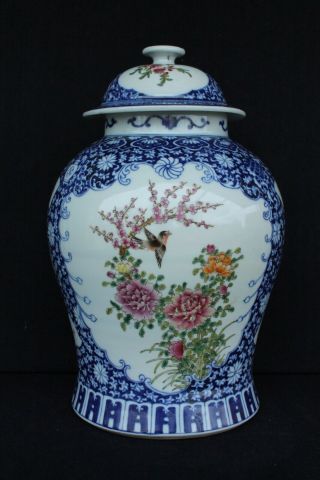 A 19th century Chinese famille rose lidded pot with birds and flowers No.  1 4