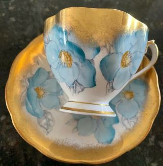 Vintage Queen Anne White and Gold Footed Tea Cup & Saucer with Magnolias Ornate 3