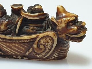 A Fine Edo Period Netsuke Of A Dragon Boat with Two Figures. 10