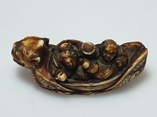 A Fine Edo Period Netsuke Of A Dragon Boat with Two Figures. 5