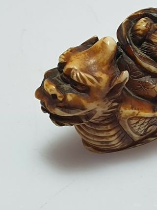 A Fine Edo Period Netsuke Of A Dragon Boat with Two Figures. 6