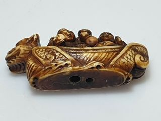 A Fine Edo Period Netsuke Of A Dragon Boat with Two Figures. 7