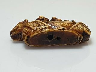 A Fine Edo Period Netsuke Of A Dragon Boat with Two Figures. 8