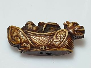 A Fine Edo Period Netsuke Of A Dragon Boat with Two Figures. 9