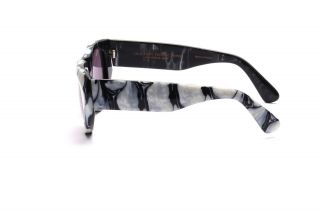 Vintage sunglasses in black and white by TRACTION PRODUCTIONS,  Mod.  BOGGY K10 4