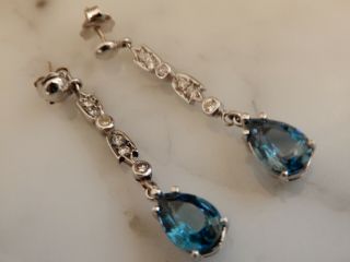 A Fabulous 9 Ct Gold 8.  00 Carat Blue Topaz And Diamond Drop Earrings