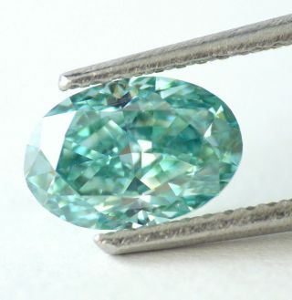 1.  21 Carat Fancy Vivid Blue Green Loose Natural Diamond Oval Cut Certified Rare