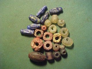 24 Roman Glass Beads.  Circa 1st - 4th Century Ad.