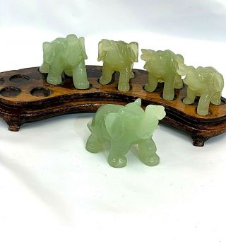 Chinese hand carved Jade elephant figurine set of 5 on matching wood stand. 2