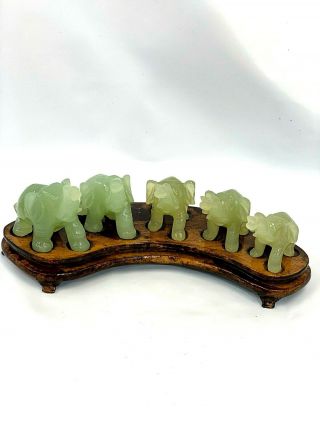 Chinese hand carved Jade elephant figurine set of 5 on matching wood stand. 3