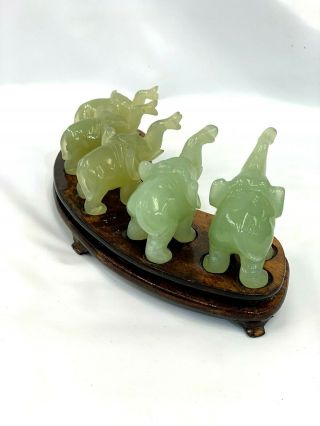 Chinese hand carved Jade elephant figurine set of 5 on matching wood stand. 4