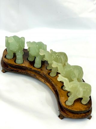 Chinese hand carved Jade elephant figurine set of 5 on matching wood stand. 7