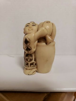 Netsuke Figurine - Old Man With Vase And Bell