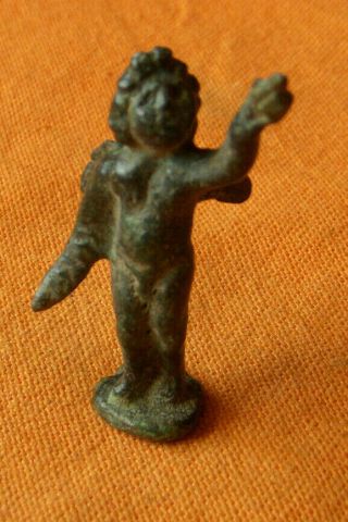 A133.  Roman Style Bronze Miniature Figurine Of Cupid.
