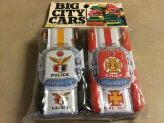 2 Vintage Tin Toy Friction Cars Police & Fire Chief