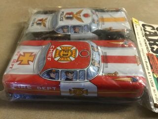 2 Vintage Tin Toy Friction Cars Police & Fire Chief 2