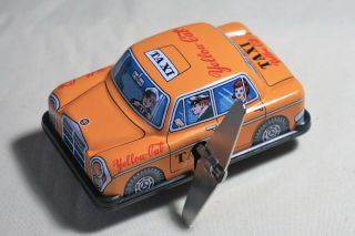 Vintage Sanko Tin Toy Wind Up Auto Turn 3 " Yellow Cab Taxi Car Made In Japan