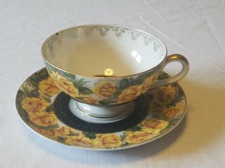 Merit China Yellow Floral Teacup And Saucer Hand Painted Japan