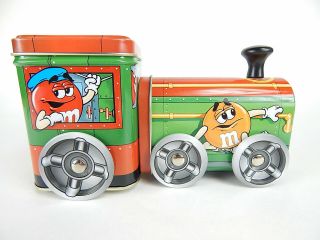 M & M Choo Choo Train Tin Box Container With Rolling Wheels