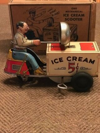 Vintage Courtland Litho Tin Windup Toy Ice Cream Scooter 6.  5 ",