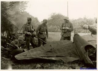 Press Photo: Great Luftwaffe Infantry Troops By Shot Down Allied Fighter Plane