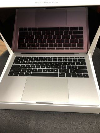 Mid - 2017 13” MacBook Pro.  Demo Unit.  Virtually.  Rarely.  Under. 2