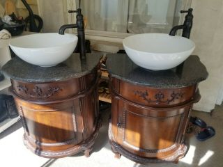 Antique look real wood round vanities with granite countertops,  vessel sinks. 3
