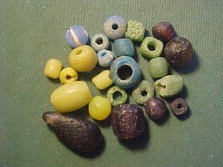 24 Roman Glass Beads Circa 1st - 4th Century Ad.