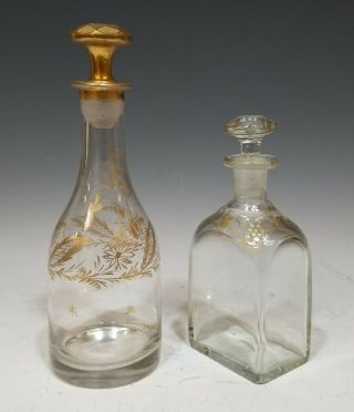 Two 19th Century French Hand Blown Gilt Decorated Decanters
