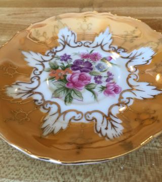 VINTAGE TEACUP AND SAUCER UNUSUAL COLORING WITH GOLD INLET AND WILD FLOWERS 2