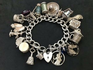 Vintage Sterling Silver Charm Bracelet With 21 Silver Charms.  136 Grams