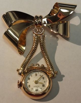 Vintage Ladies Bow Pin Watch In 18 Karat Yellow Gold With Mundus Watch