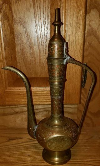 Vintage India Brass Tall Lidded Tea Pot Detailed Etched Design Red Background