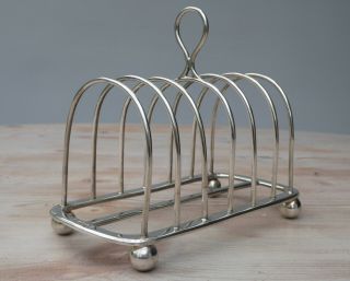 Antique Silver Toast Rack,  London 1889,  William Hutton & Sons