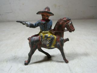 Vintage/antique Barclay Manoil Lead Toy Cowboy On Horse Shooting Revolver Damage