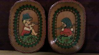 Antique Wooden Plates That Are Hand Carved And Hand Painted.