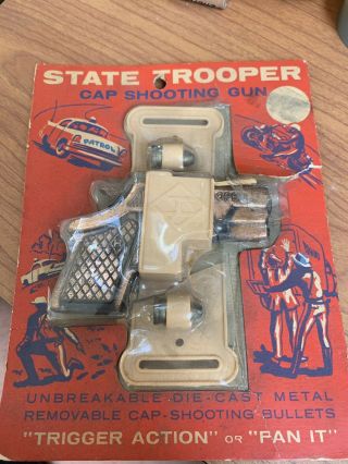 Leslie Henry - State Trooper Hide A Way - Die Cast Metal - Cap Toy