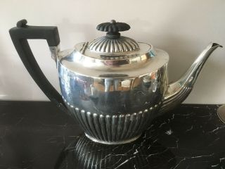 A solid silver teapot Sheffield 1901 maker Atkin Brothers 560 grams 17 cm tall 2