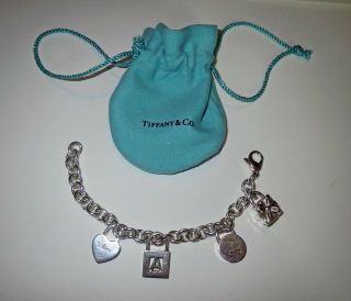 Tiffany & Co York City Sterling Silver 4 Charm Bracelet - Value $1200.  00