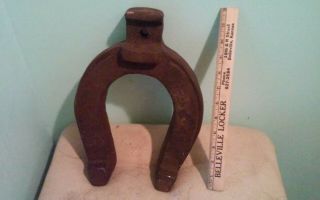 Vintage Cast Iron Horse Shoe Windmill Weight.