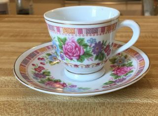Vintage Teacup And Saucer Flowers And Pink Roses