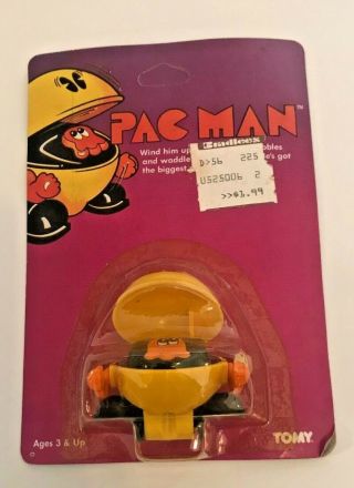 Vintage Pac Man Wind Up.  1982 Tomy,  On Card (a052)
