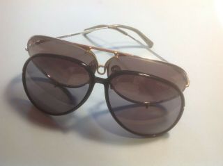 Porsche Design sunglasses,  numbered and dated.  case and 2