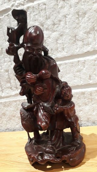 LARGE VINTAGE HAND CARVED CHINESE HOLY WOODEN FIGURE WITH BOY AND CRANE.  26.  5CM. 2