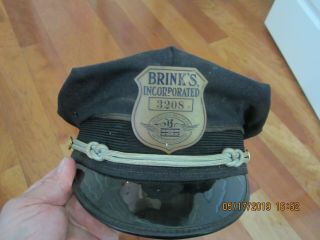 Brinks Vintage Incorporated Brass Hat Badge With Hat.