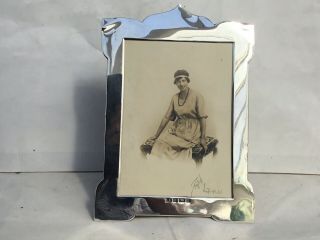 A Late Victorian Art Nouveau Silver Photograph Frame,  1900