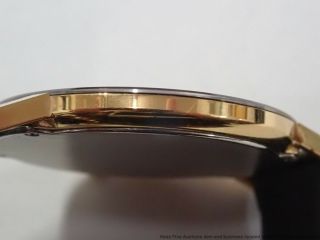 1990s Movado 87 - 40 - 882 Vintage Gold Black Mirror Finish Round Thin Mens Watch 9