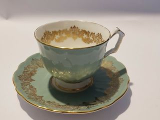 Aynsley Light Green With Fancy Gold Trim And Pattern Footed Tea Cup And Saucer